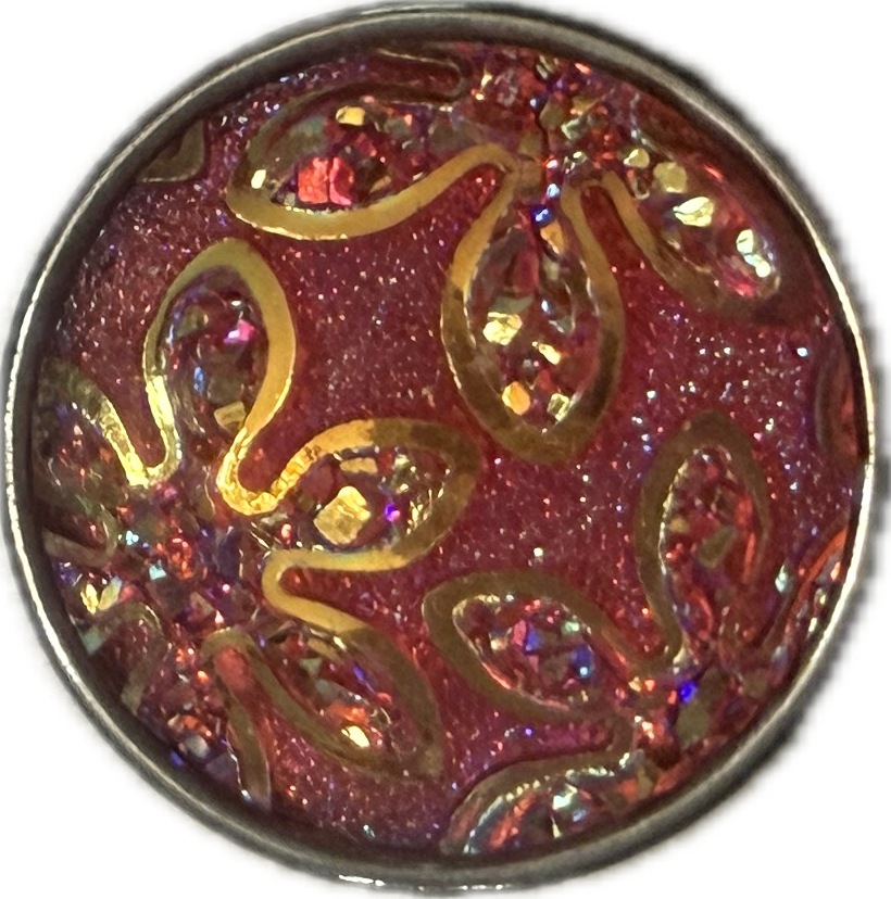 A round snap charm featuring a pink glittery flower design with a metallic edge.