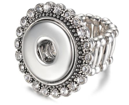 Rhinestone-studded adjustable stretch ring designed to fit 20mm snap jewelry.