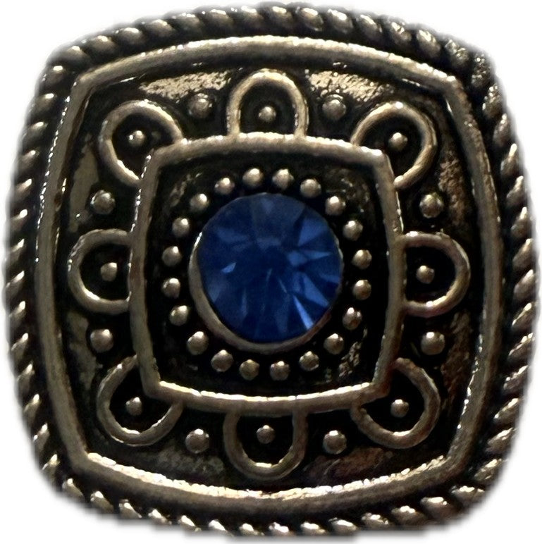 Simple Elegance Jewelry 20mm square snap charm with blue rhinestone, intricate silver metal filigree, and rope border.