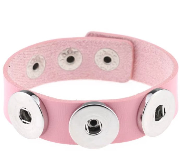 Simple Elegance Jewelry pink leather triple snap bracelet featuring three silver 20mm interchangeable charm mounts