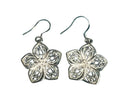 Simple Elegance Jewelry silverplated flower dangle earrings with intricate open cut-out filigree design on blue background