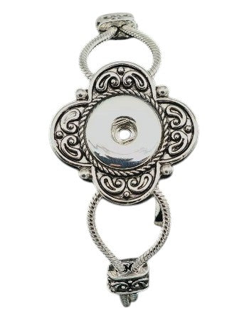Simple Elegance Jewelry silver 20mm snap bracelet featuring a decorative flower toggle and double chain design.