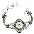 Simple Elegance Jewelry silver double chain 20mm snap bracelet with an ornate flower toggle closure