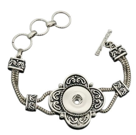 Simple Elegance Jewelry silver double chain 20mm snap bracelet with an ornate flower toggle closure
