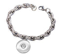 Simple Elegance Jewelry stainless steel cable link bracelet with a 20mm round dangle snap charm on a blue background.